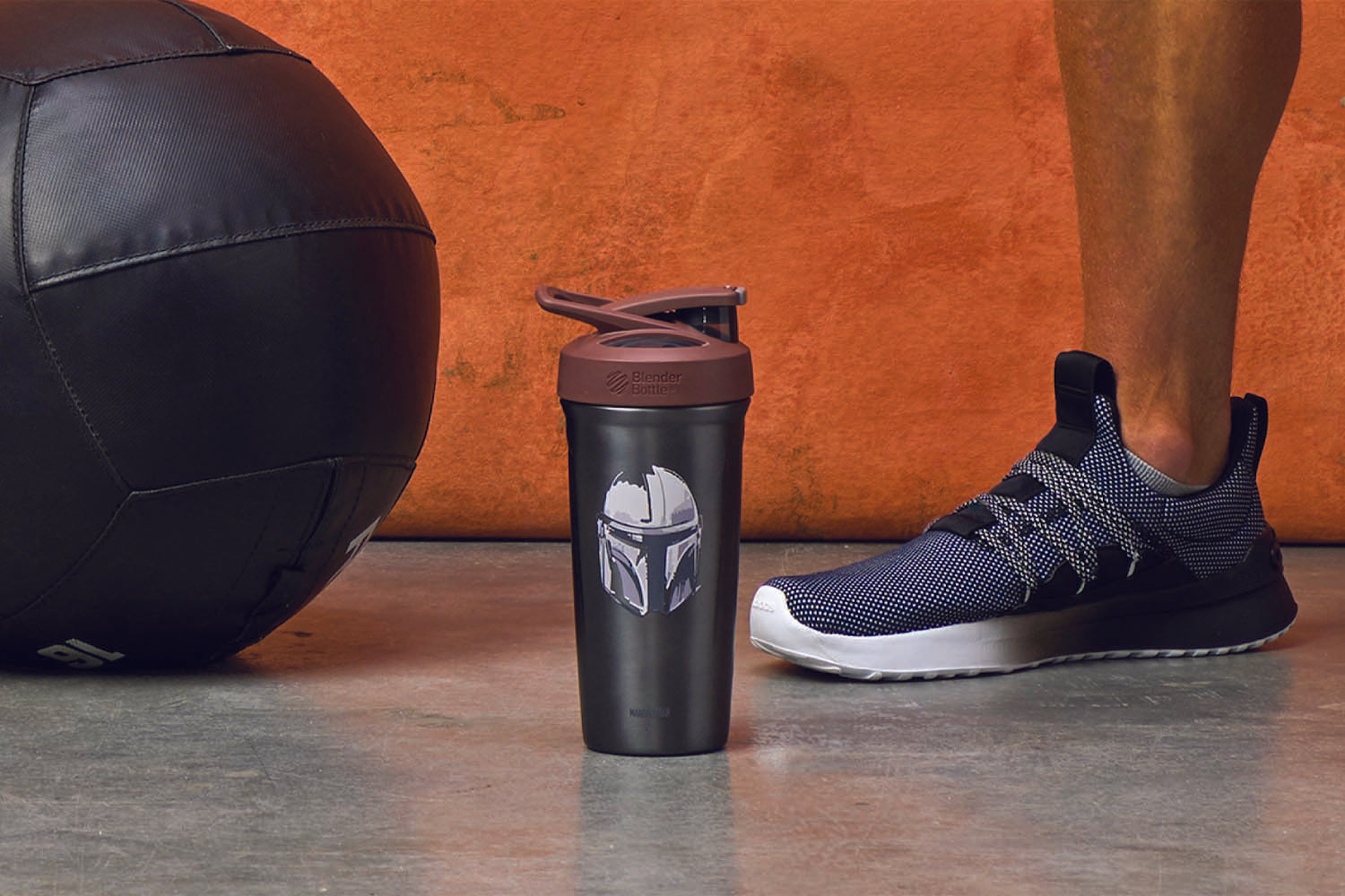 The Mandalorian helmet shaker bottle on the gym floor - BlenderBottle