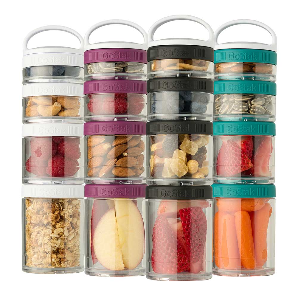 GoStak food containers filled with various snacks, like fruits, veggies, and nuts