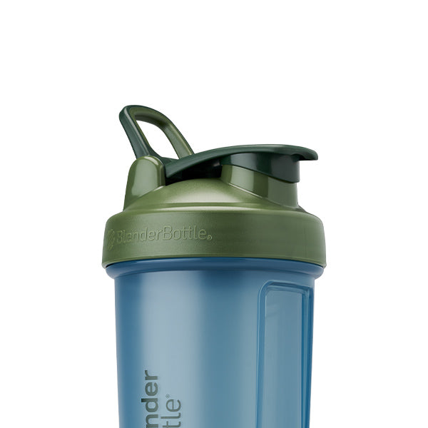 Blue and green protein shaker with a flip cap and spout guard