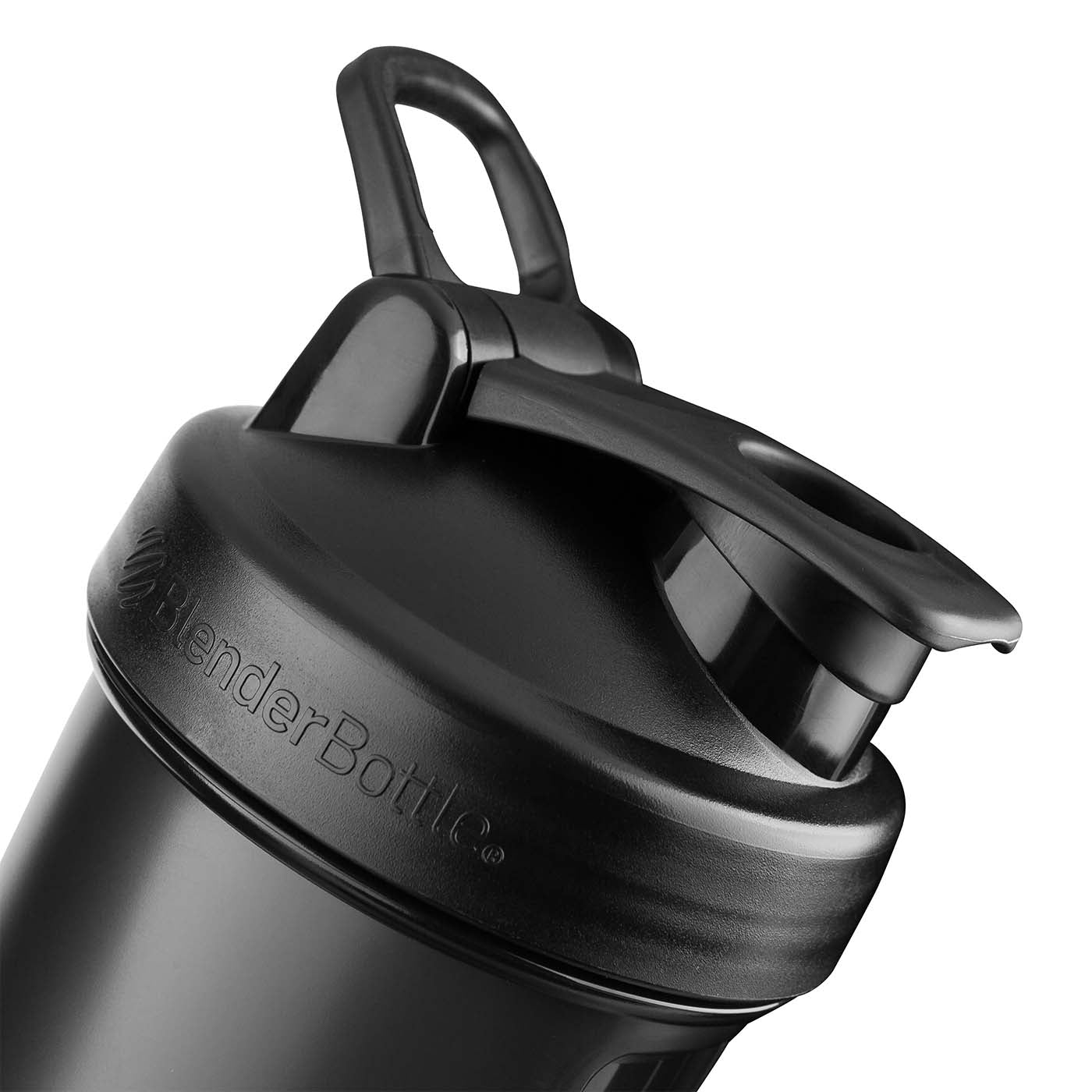 An image of the lid of a black BlenderBottle shaker bottle. The lid has a twist-on design, with a flip cap that snaps securely in place to prevent leaks and spills. The lid also features a loop for easy carrying, and a protected drinking spout that is covered by a removable cap. The image highlights the practicality and functionality of the BlenderBottle design, with the focus on the lid and its various features. The background is blurred and neutral, with the focus on the lid of the bottle.