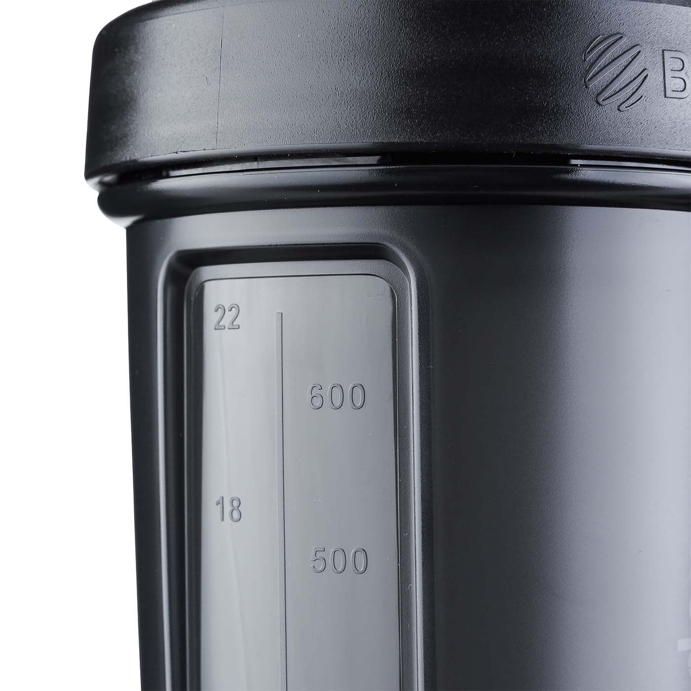 Close-up photo of BlenderBottle shaker's ml/oz measurement markings. Black plastic design for accurate measurement. Functional & convenient.
