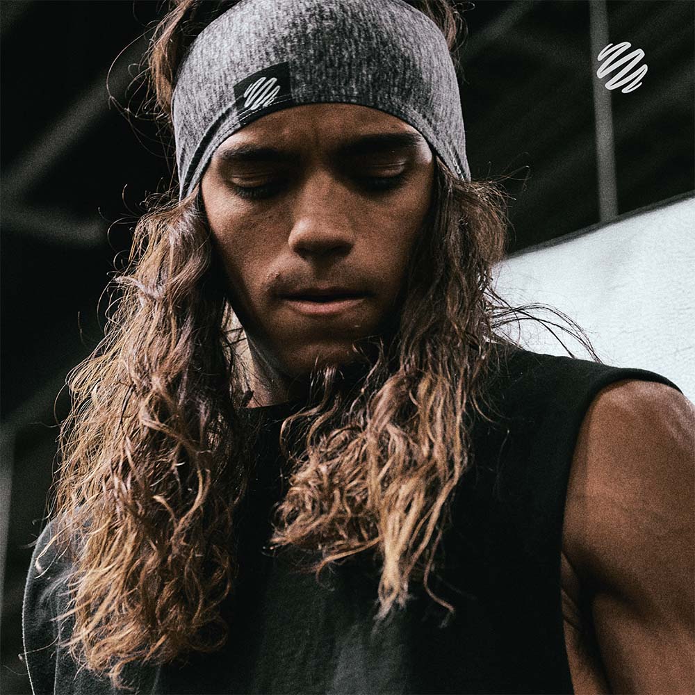 Man wearing BlenderBottle headband in the gym - made by Junk Headbands