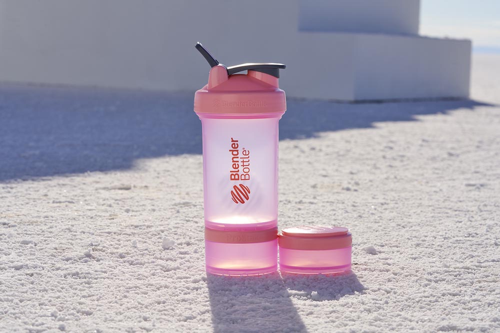 ProStak shaker bottle and supplement storage in pink.