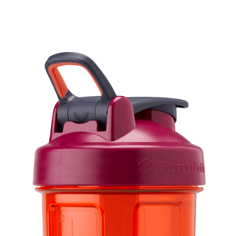 Adjustable carry loop on a red shaker bottle.