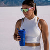 Man working out with Stainless Steel shaker on the ground.